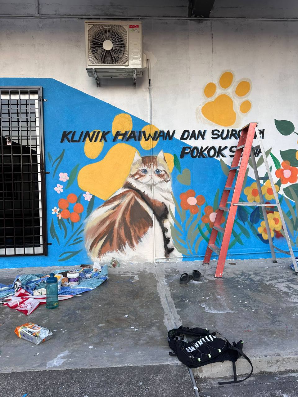 Outdoor waterproof mural painted on an exterior animal clinic wall in Selangor