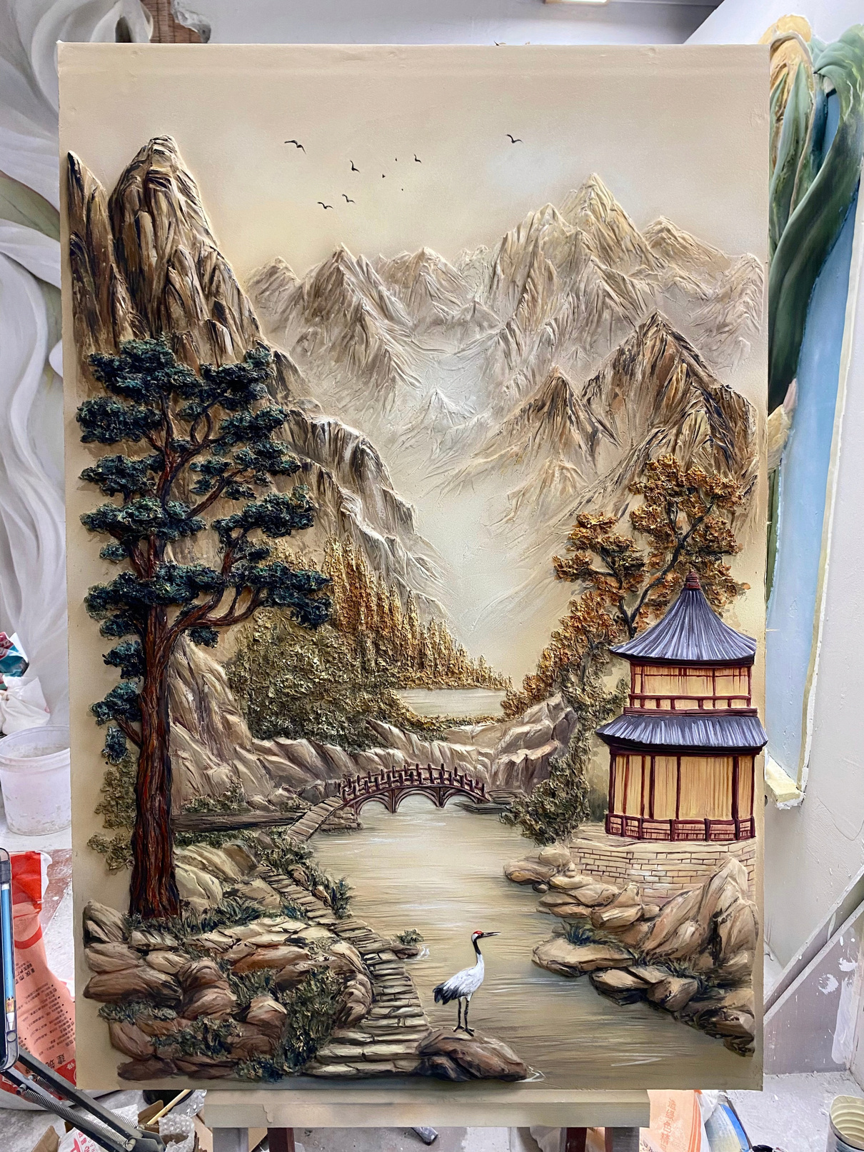 Landscape relief on a workshop easel